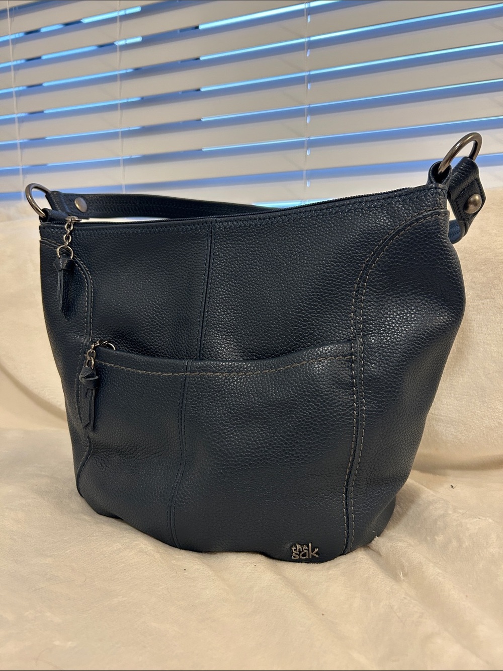The Sak Navy Pebbled Leather Shoulder Bag with Front Zip Pocket